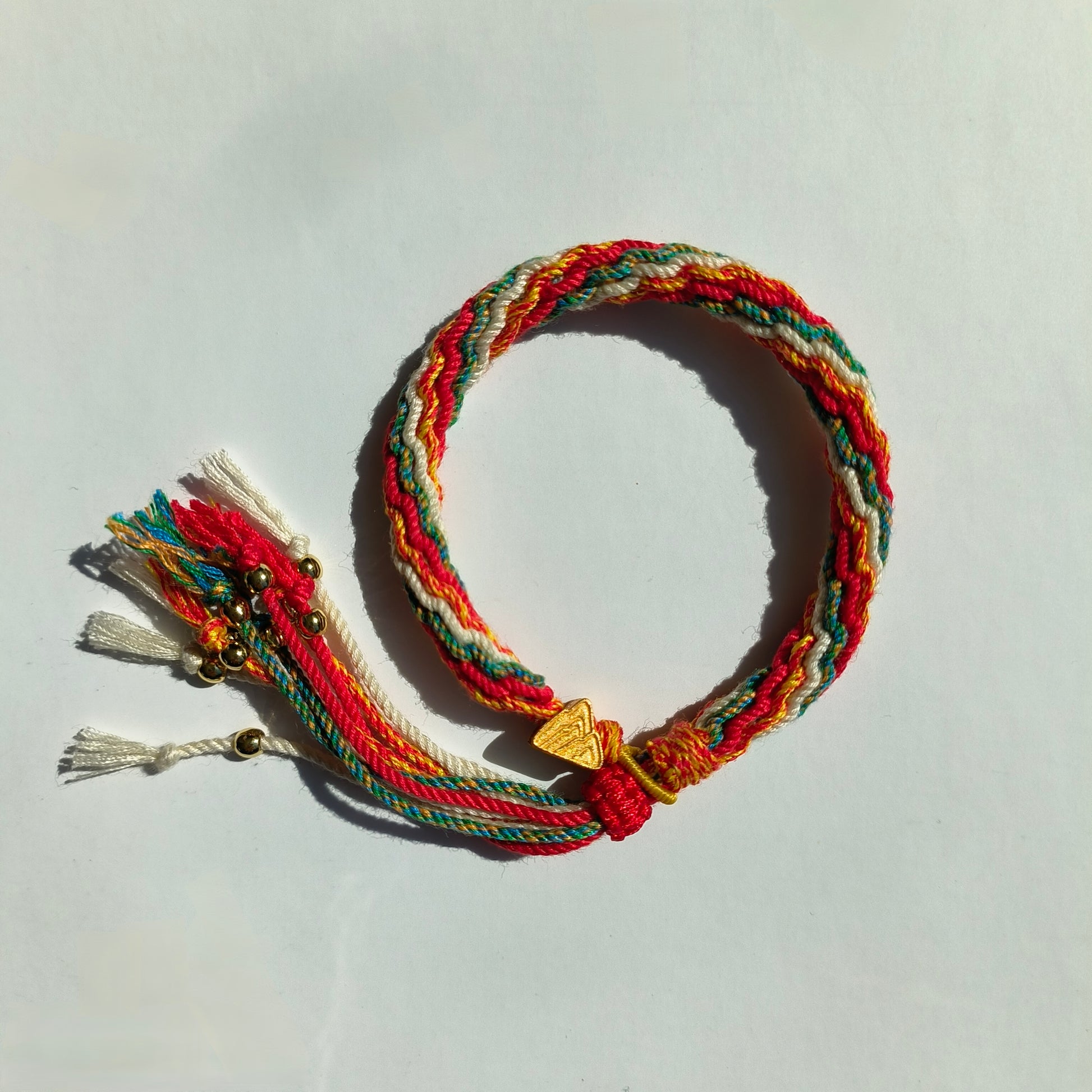 Soleil Nomade – Bracelet tressé multicolore